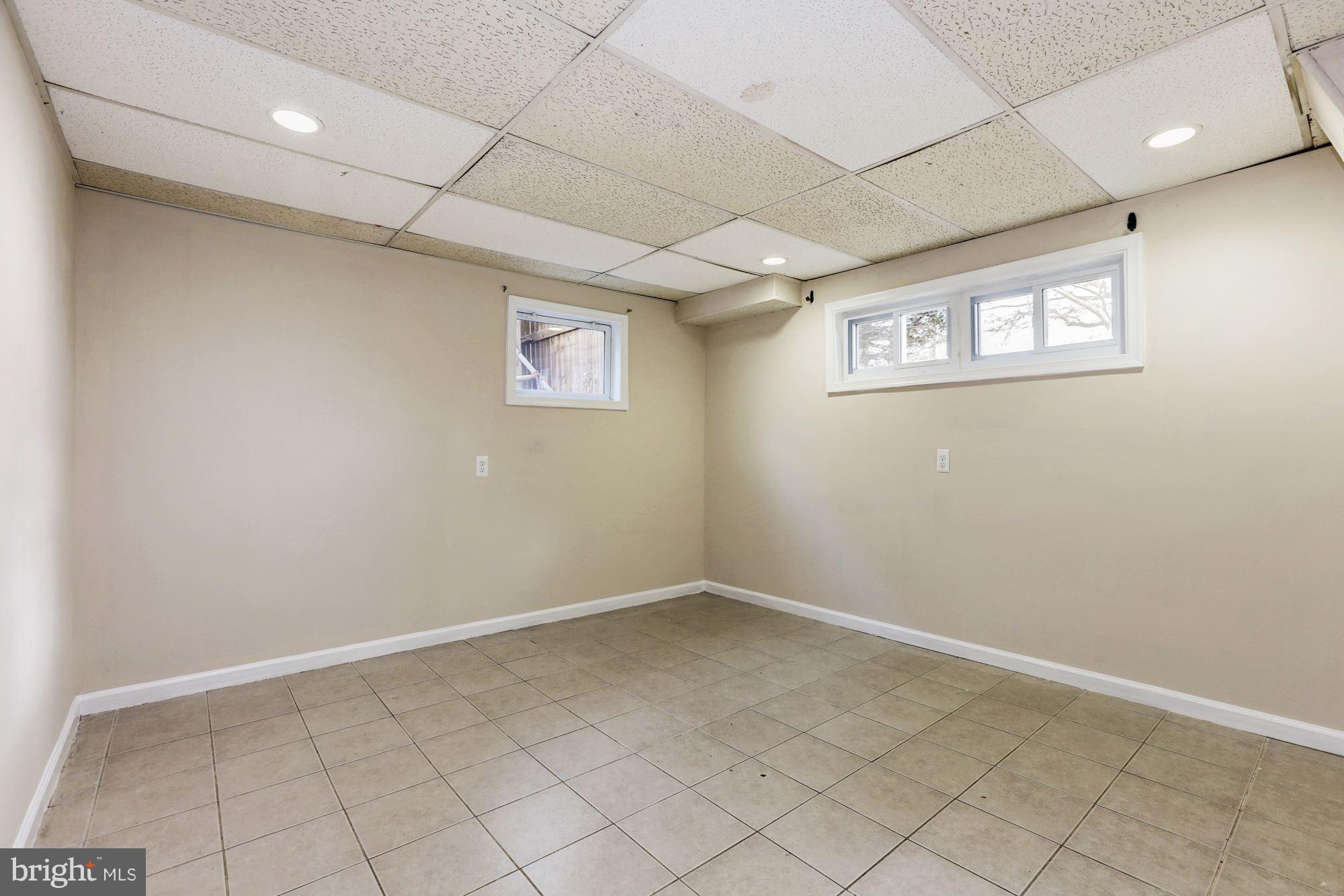 12409 Littleton Street Silver Spring, MD 20906 - Photo 23 of 31 an empty room with windows