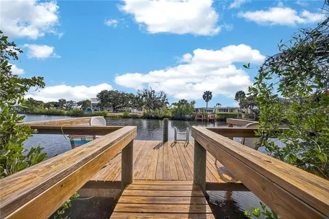 a view of swimming pool with a lake view