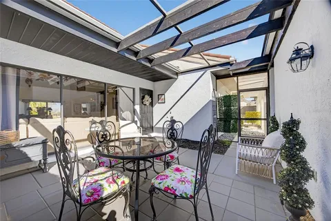 a outdoor dining space with furniture