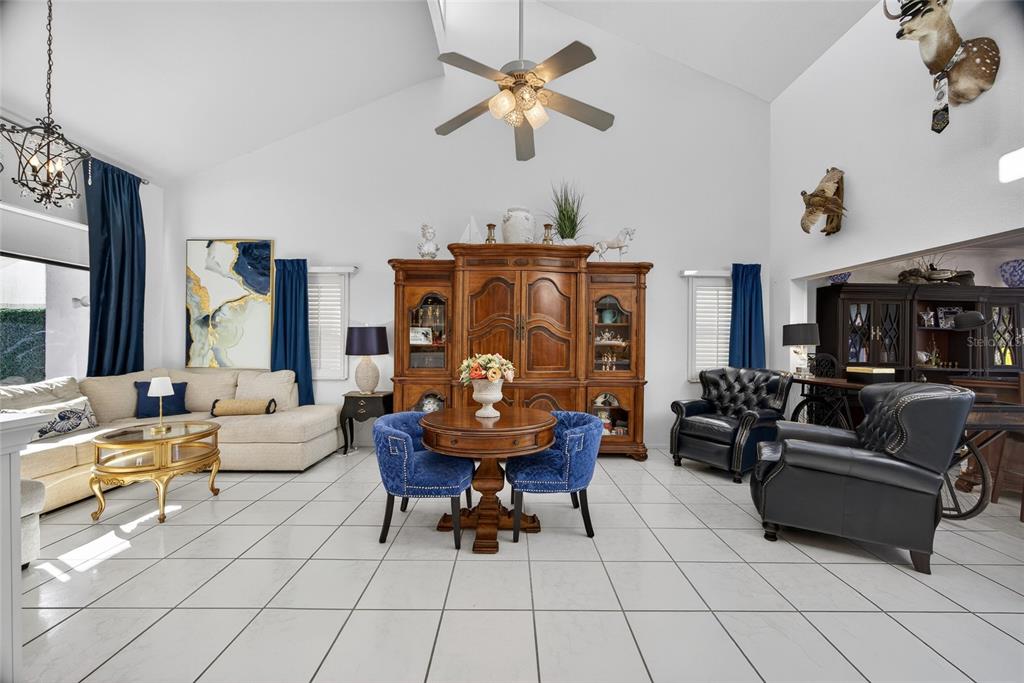 5061 San Rocco Court Punta Gorda, FL 33950 - Photo 6 of 32 a living room with furniture and a large window