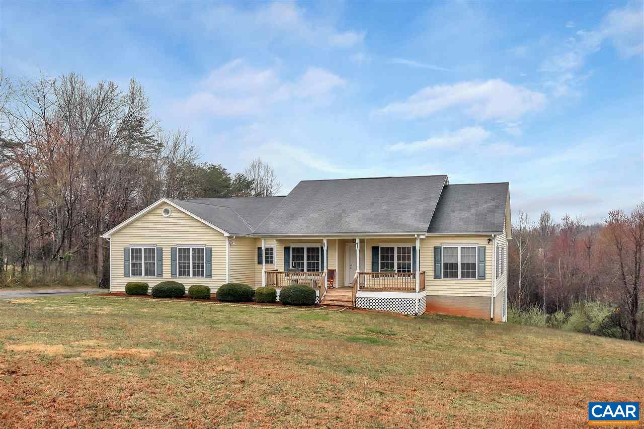5875 Amicus Road Ruckersville, VA 22968 - Photo 1 of 31 a front view of a house with a garden