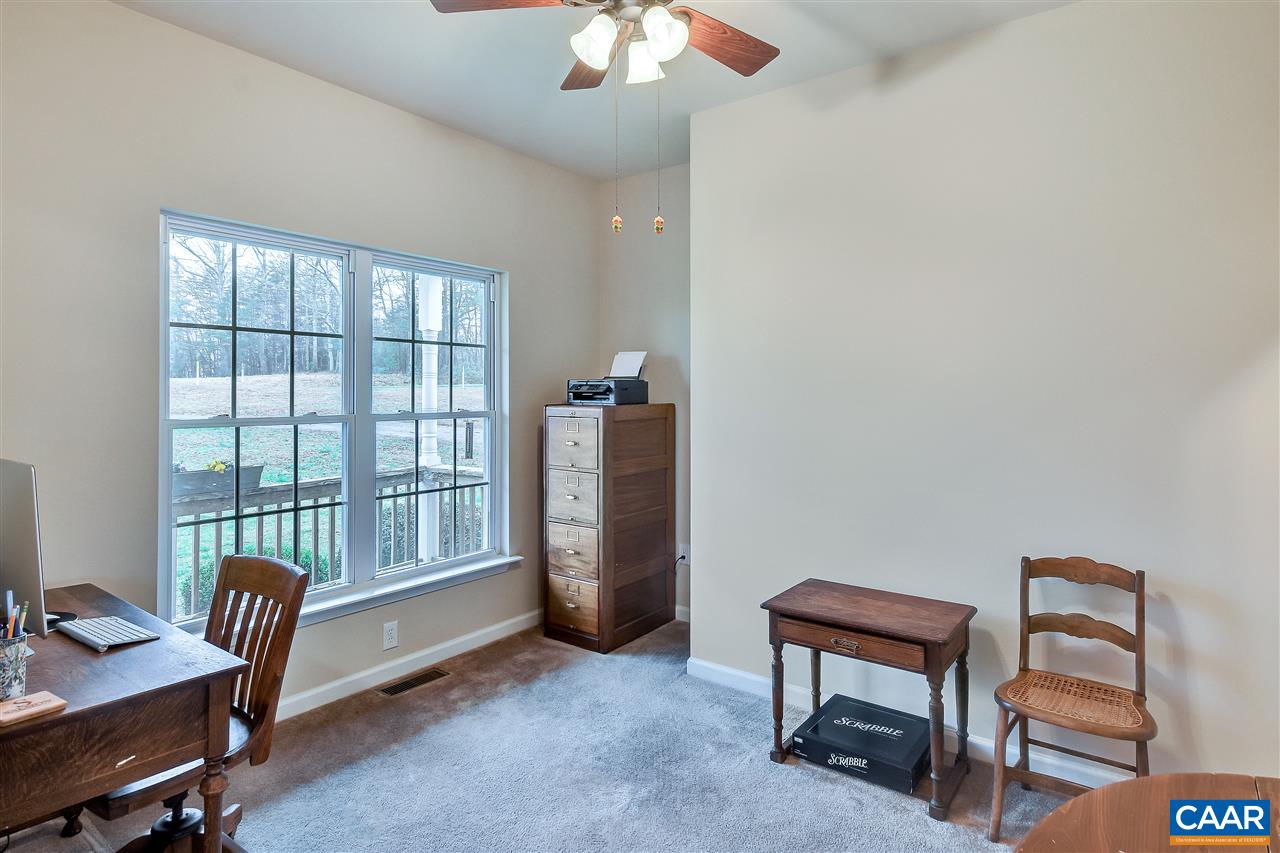 5875 Amicus Road Ruckersville, VA 22968 - Photo 13 of 31 a view of a workspace with furniture and a window