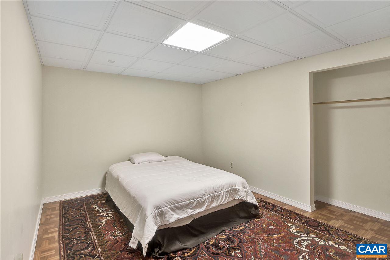 5875 Amicus Road Ruckersville, VA 22968 - Photo 26 of 31 a bedroom with a bed and a window