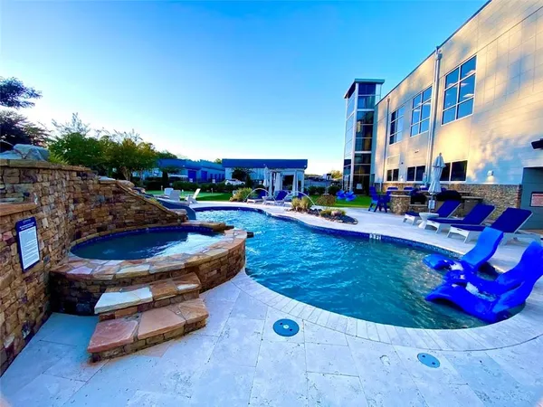 a view of a building with a swimming pool