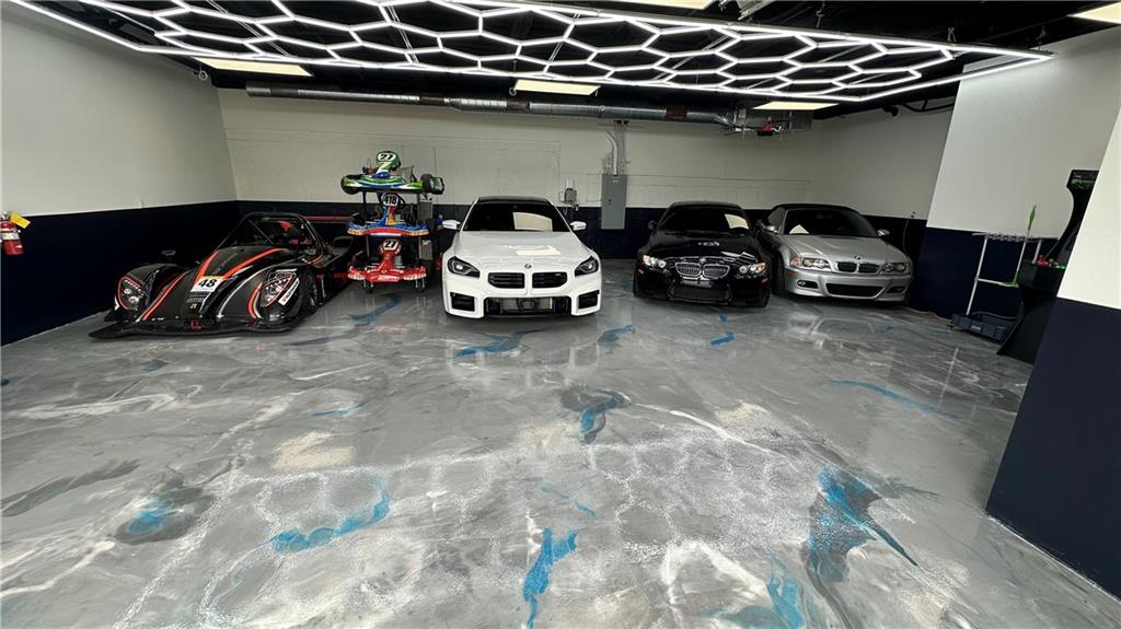 702 Joe Lane Cox Road, Unit 203 Dawsonville, GA 30534 - Photo 9 of 60 a view of a garage