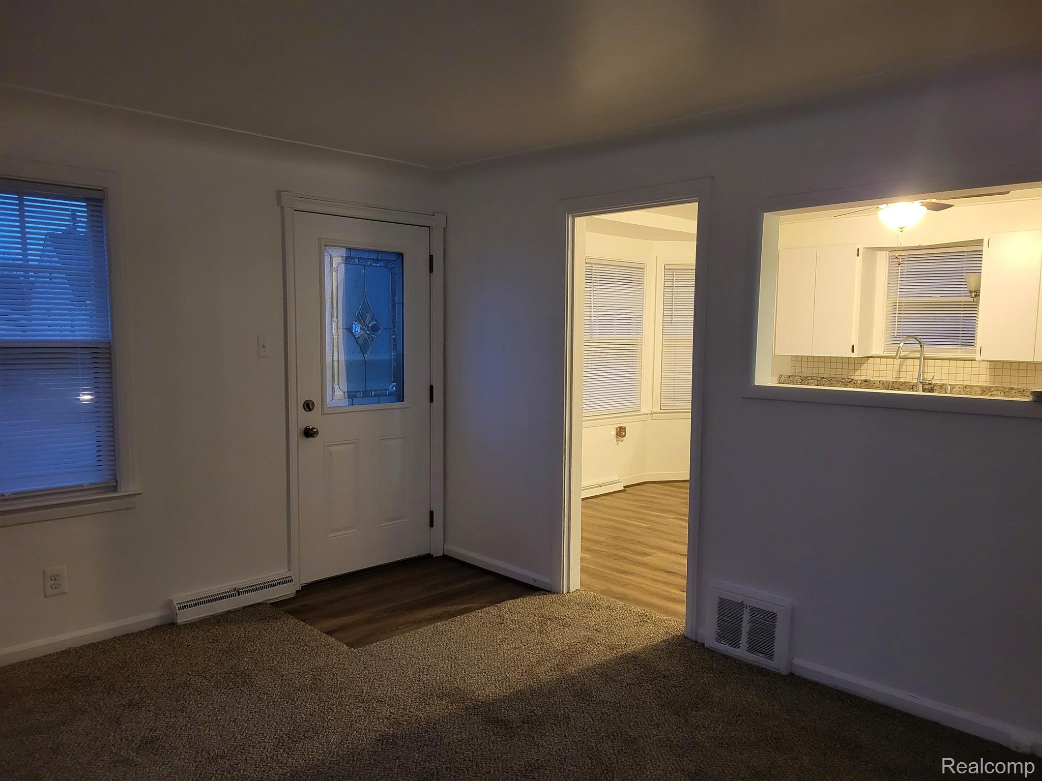 Nice Living Rm beautiful stained glass door 