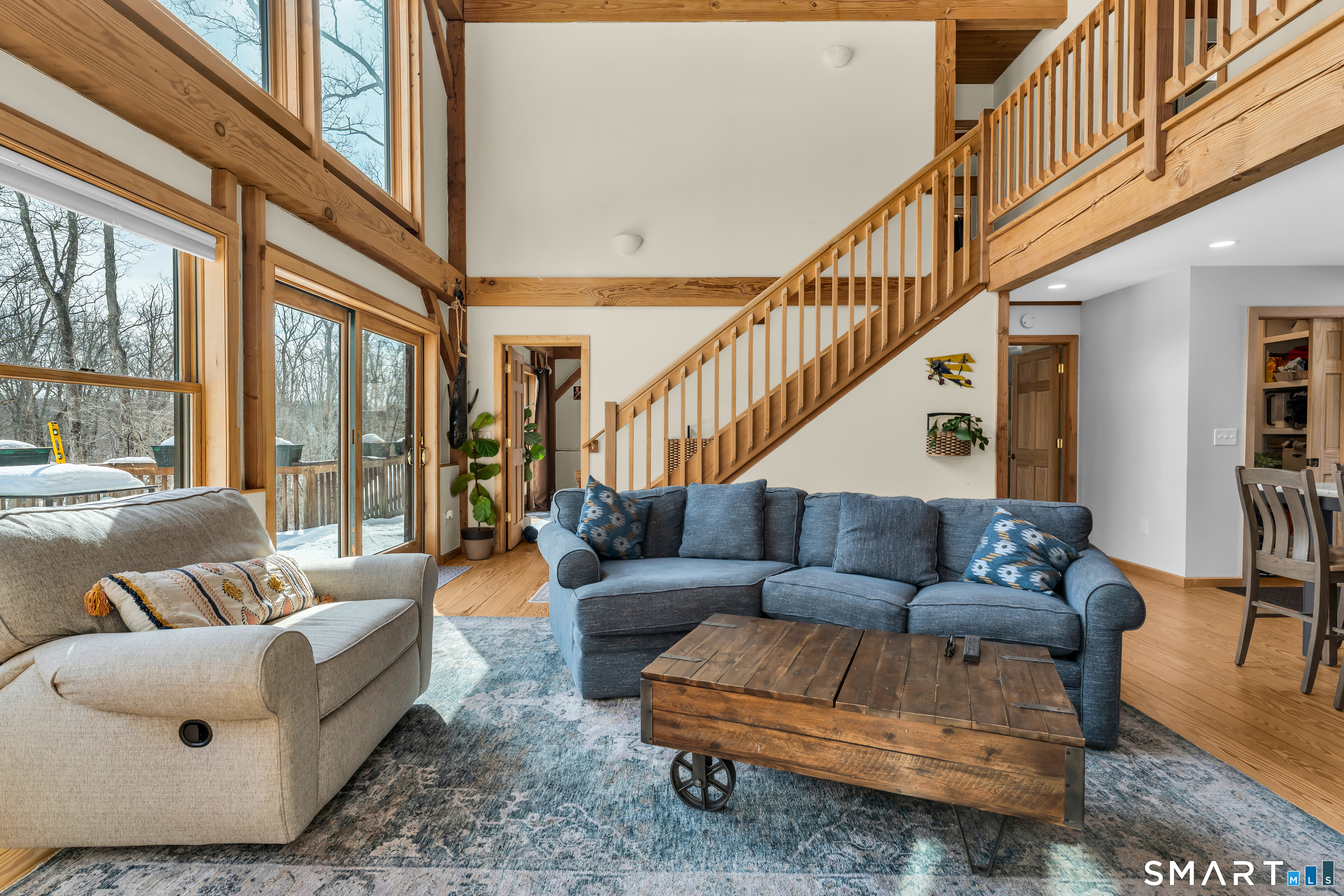 167 Round Hill Road Salem, CT 06420 - Photo 16 of 48 a living room with furniture and a large window