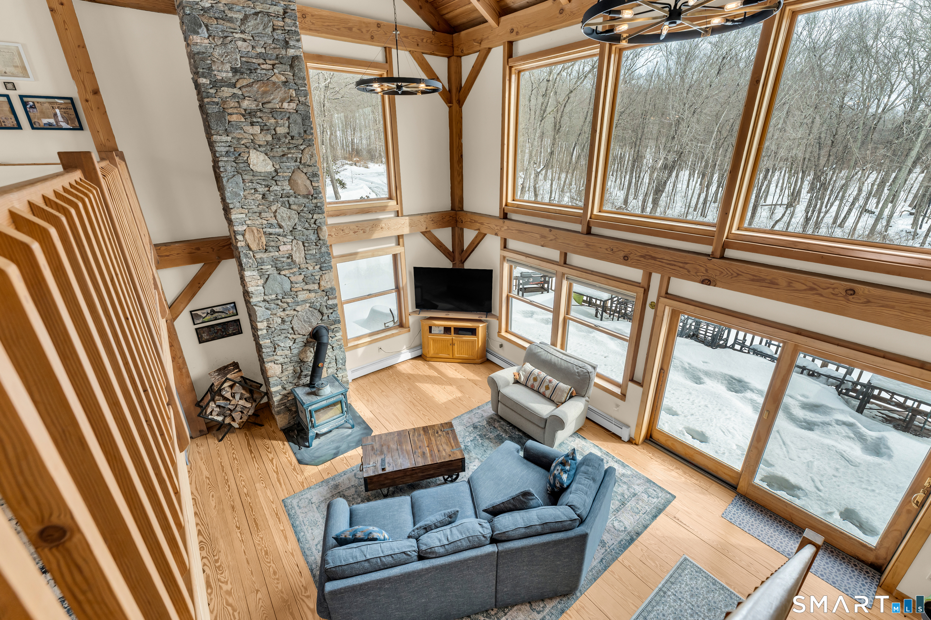167 Round Hill Road Salem, CT 06420 - Photo 20 of 48 a living room with furniture and a fireplace