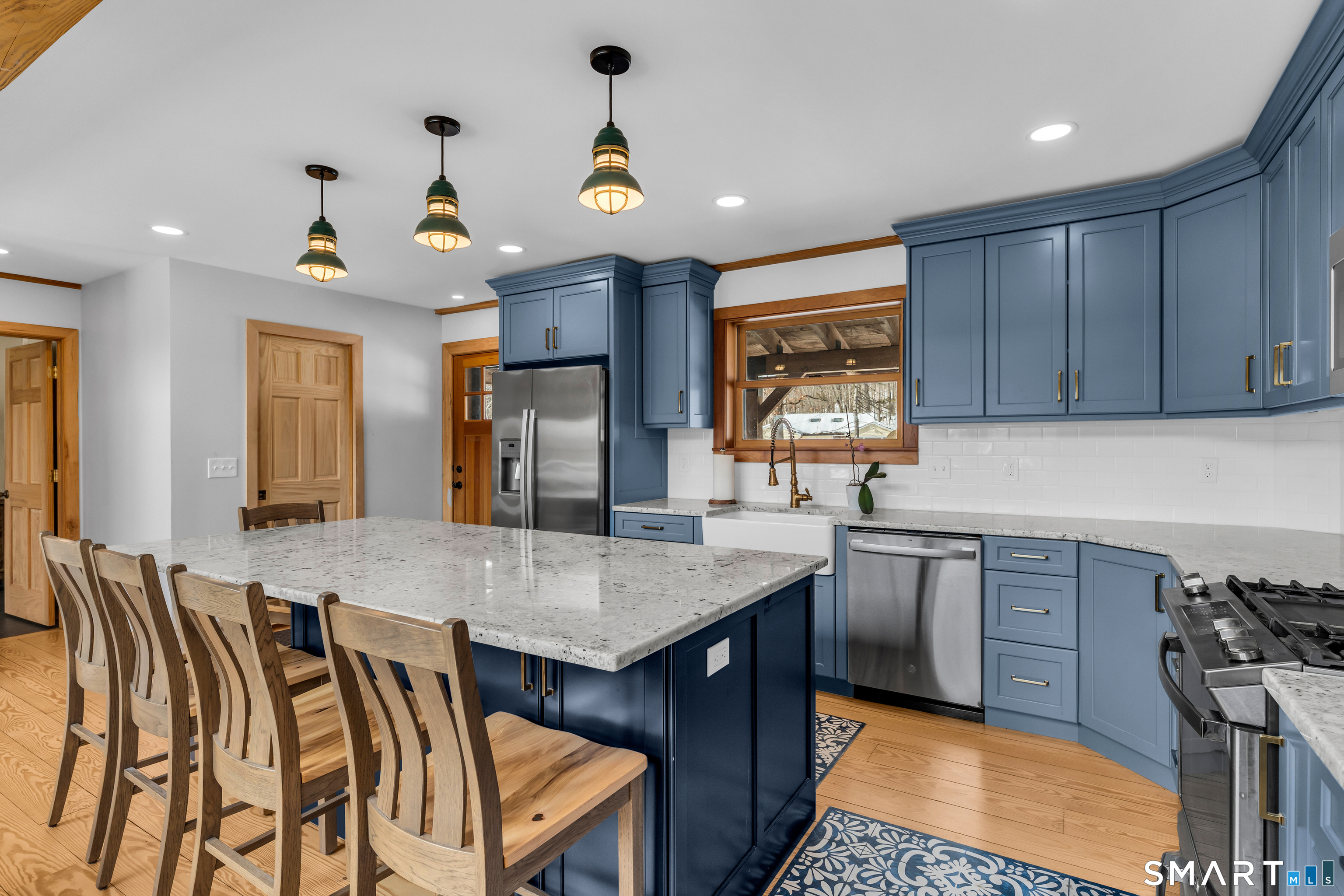 167 Round Hill Road Salem, CT 06420 - Photo 23 of 48 a kitchen with a stove a sink and a refrigerator