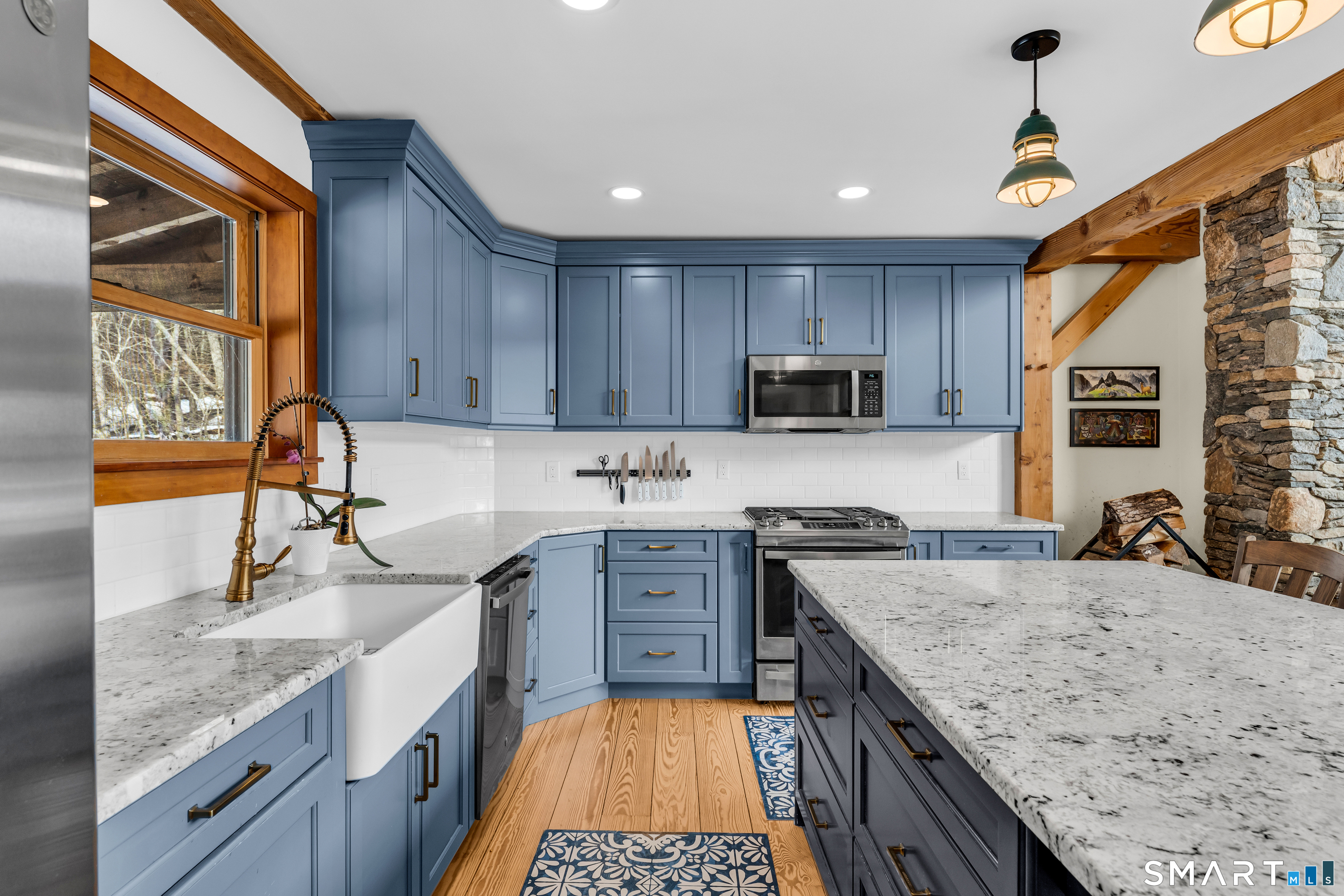 167 Round Hill Road Salem, CT 06420 - Photo 28 of 48 a kitchen with a sink stove and refrigerator
