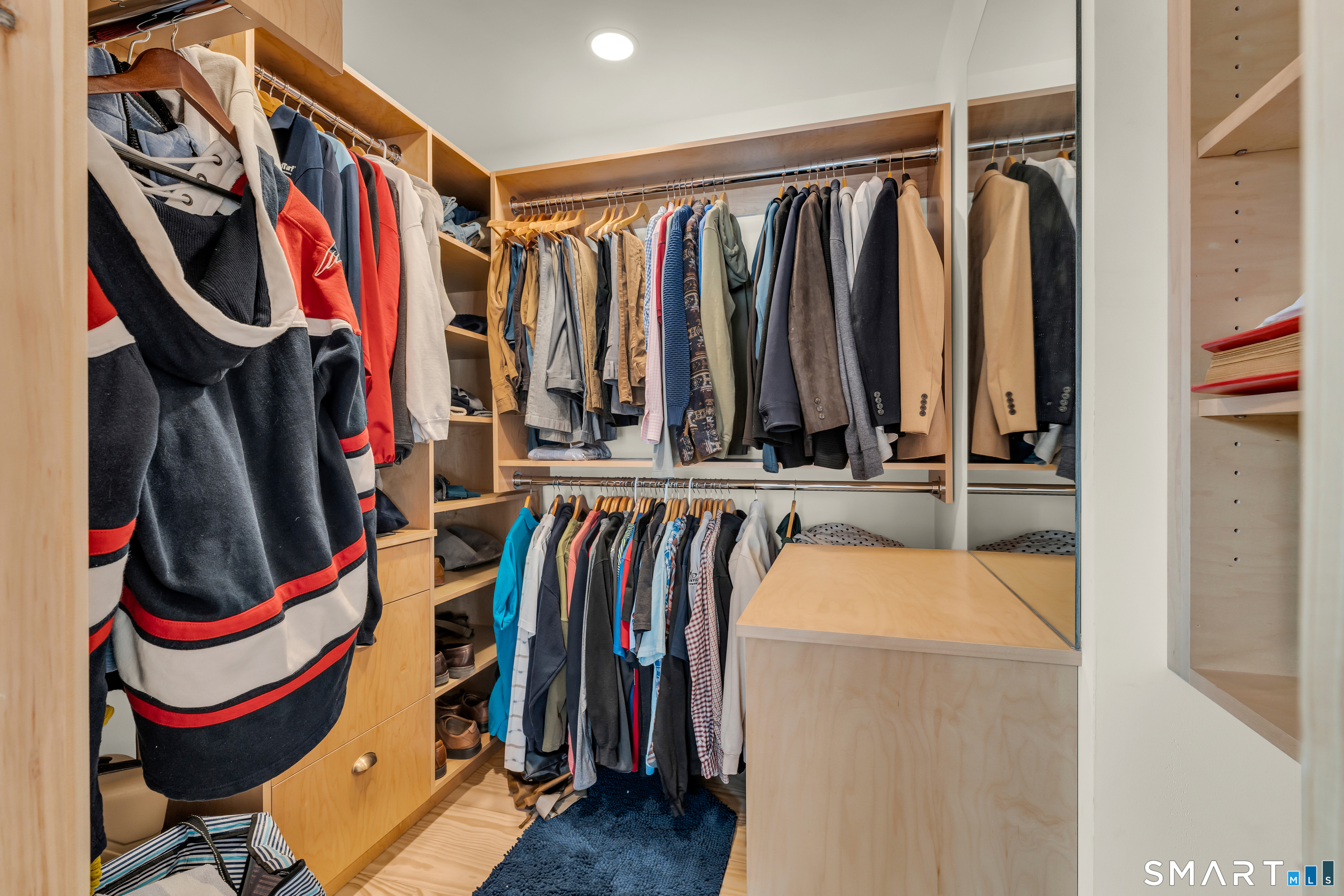 167 Round Hill Road Salem, CT 06420 - Photo 31 of 48 a view of walk in closet with clothes