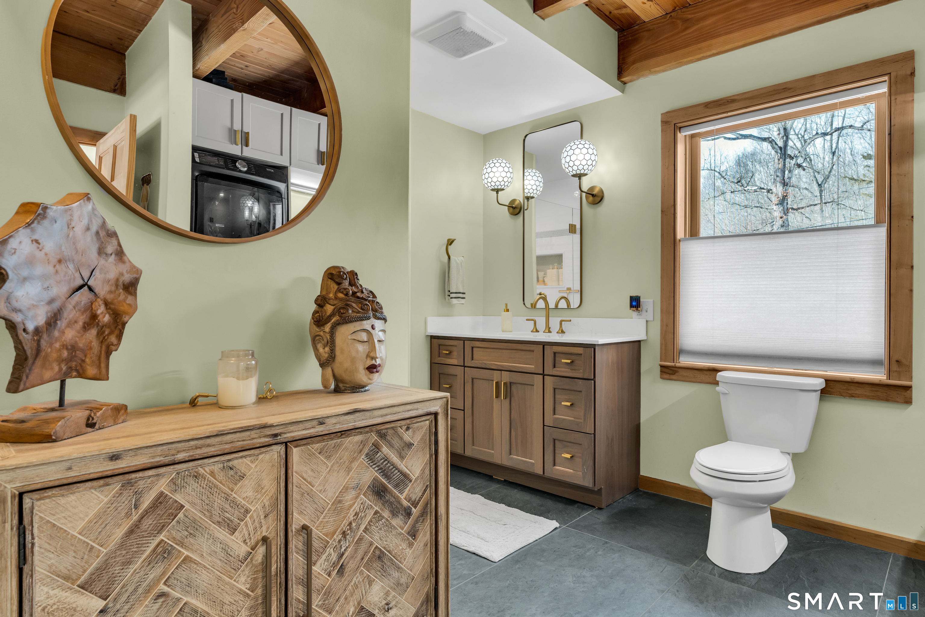167 Round Hill Road Salem, CT 06420 - Photo 32 of 48 a bathroom with a toilet a sink and a mirror