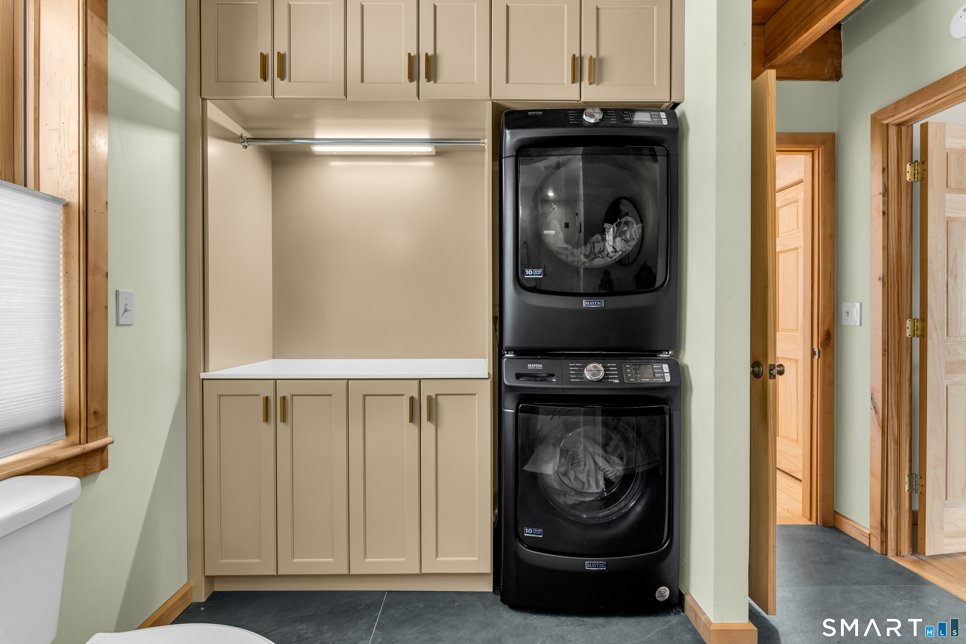 167 Round Hill Road Salem, CT 06420 - Photo 34 of 48 a close view of a utility room with dryer and washer