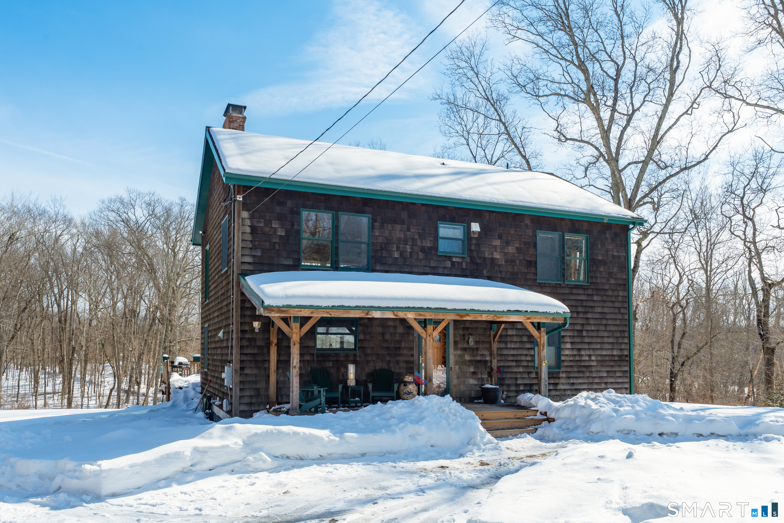 167 Round Hill Road Salem, CT 06420 - Photo 4 of 48 a front view of a house with a yard