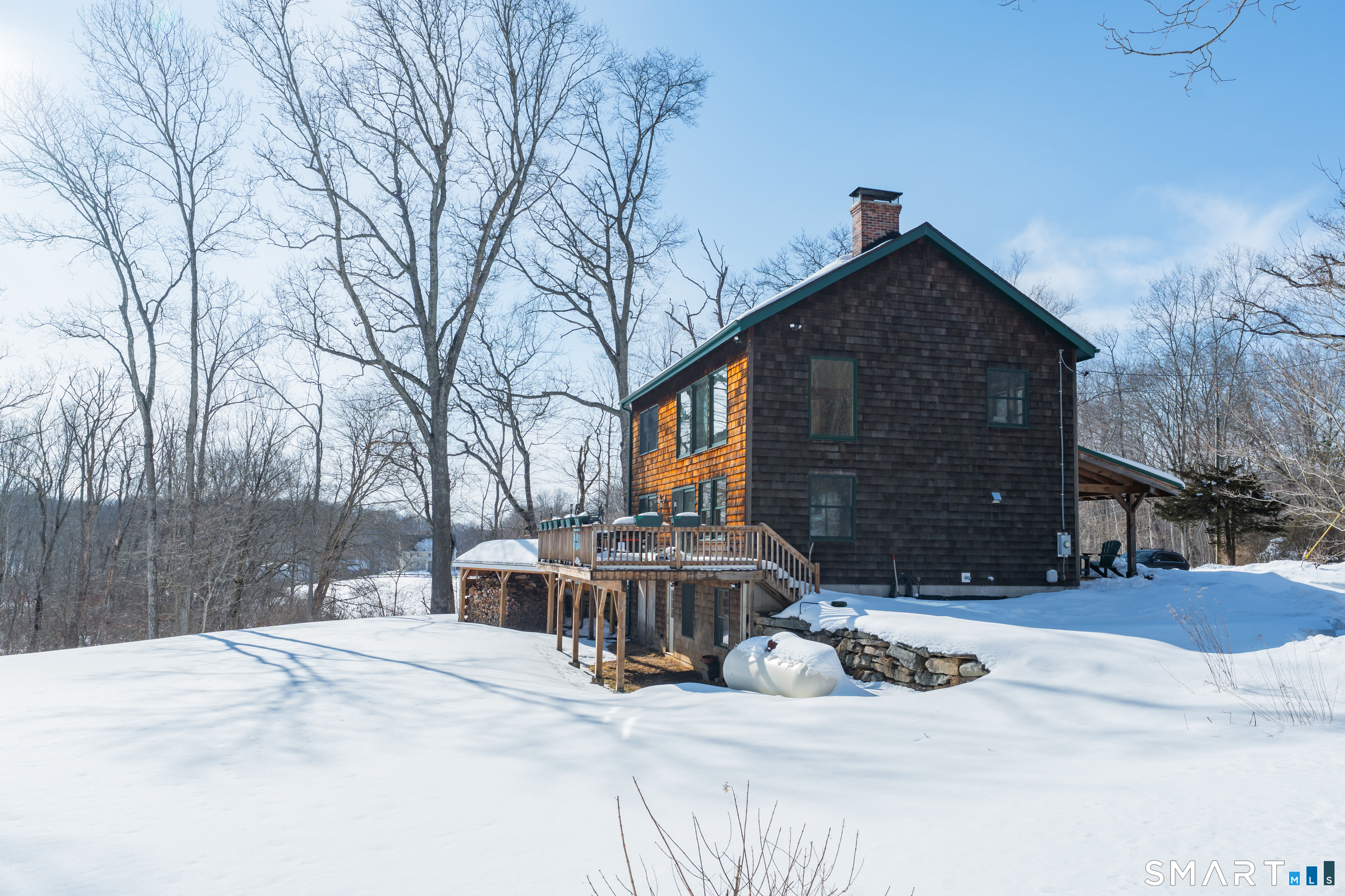 167 Round Hill Road Salem, CT 06420 - Photo 6 of 48 a view of a house with snow on the road