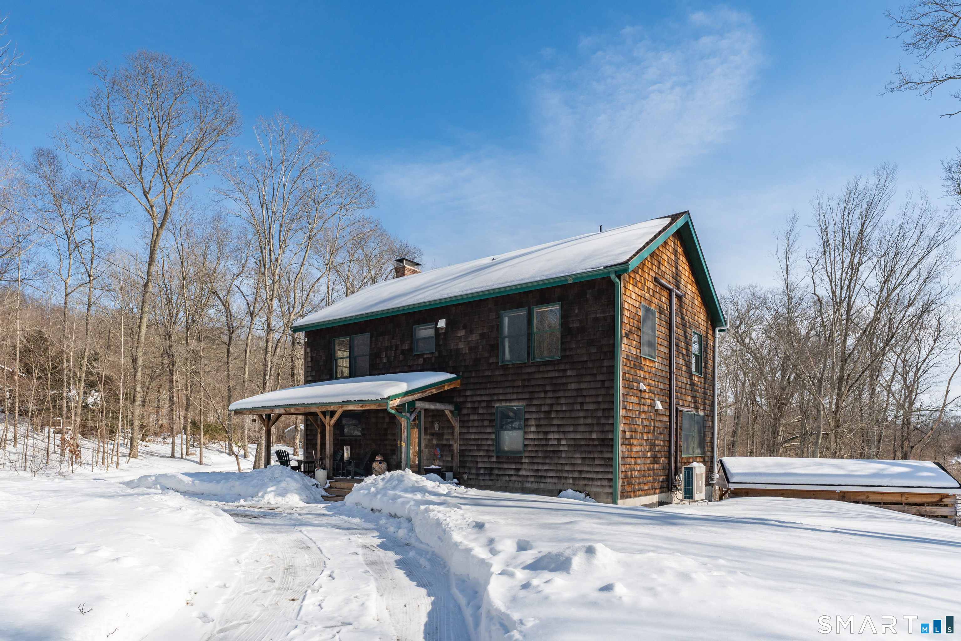 167 Round Hill Road Salem, CT 06420 - Photo 10 of 48 a view of a house with wooden fence