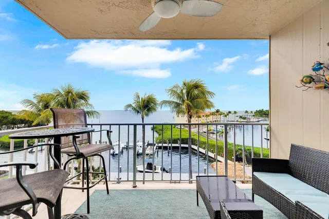 a view of a balcony with chairs