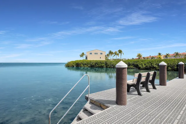 a view of a balcony with furniture