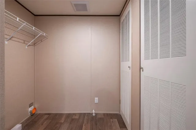 a view of small space with racks on the wall