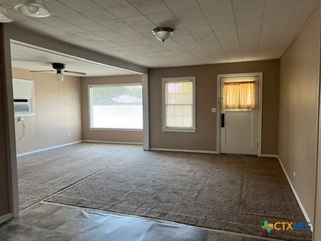 an empty room with windows