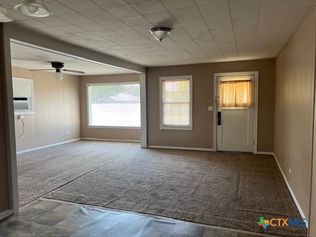 208 Sample Street Edna, TX 77957 - Photo 3 of 10 an empty room with windows