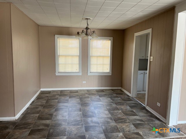 208 Sample Street Edna, TX 77957 - Photo 5 of 10 a view of an empty room with a window