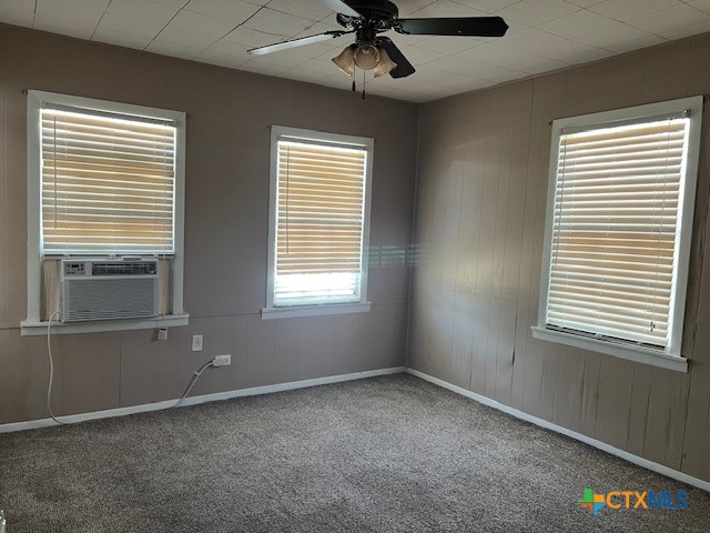 208 Sample Street Edna, TX 77957 - Photo 8 of 10 a view of an empty room with a window