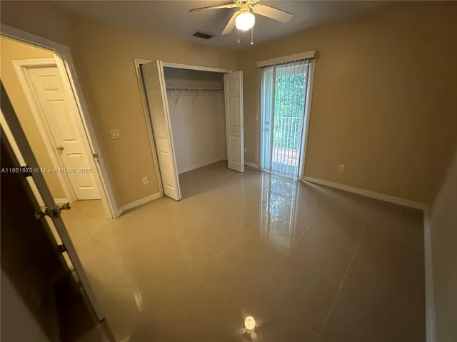 an empty room with window