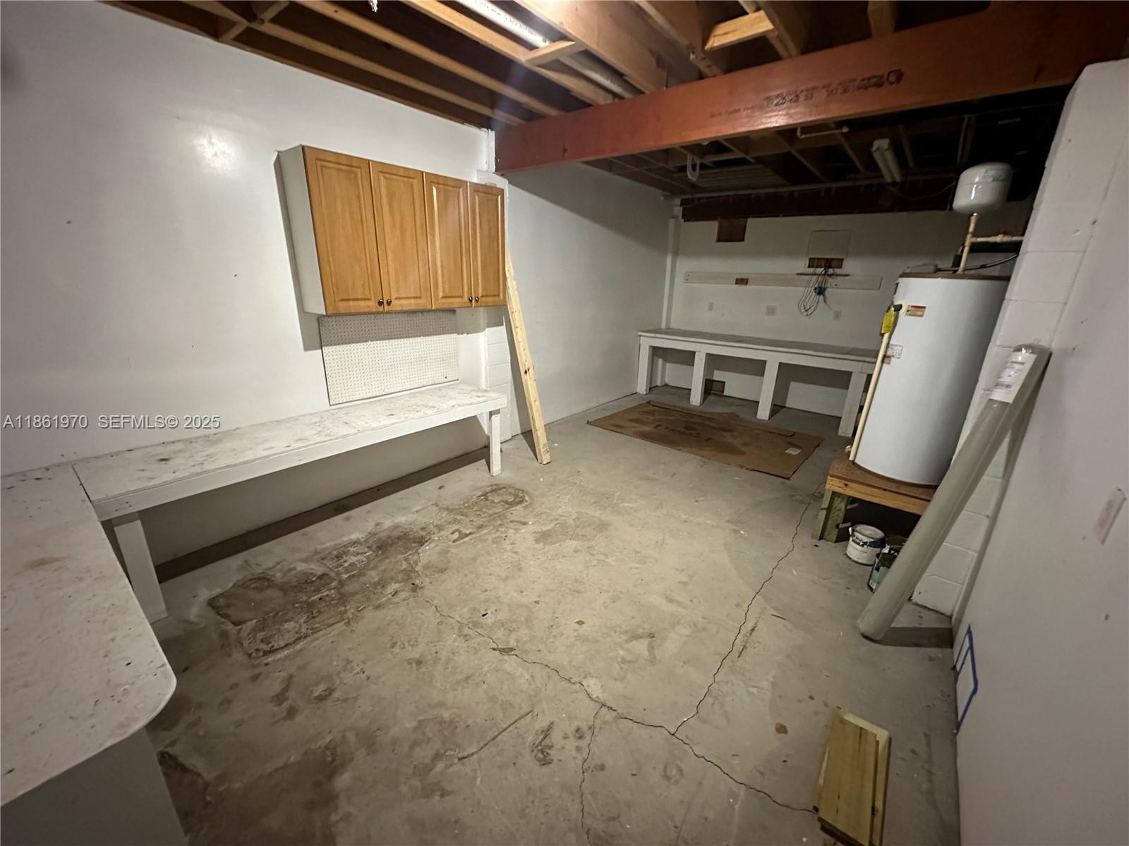 5548 Birdsong Lane, Unit 1 Bokeelia, FL 33922 - Photo 23 of 24 a view of storage and utility room