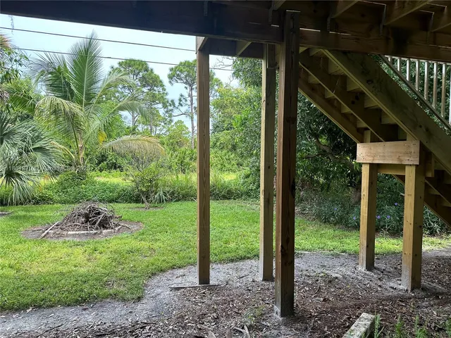 a view of a porch with a yard