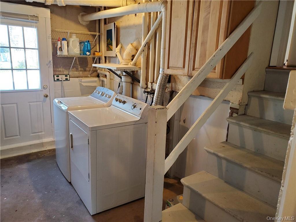 215 Harriman Road Irvington, NY 10533 - Photo 19 of 20 Laundry room with laundry area and washing machine and clothes dryer