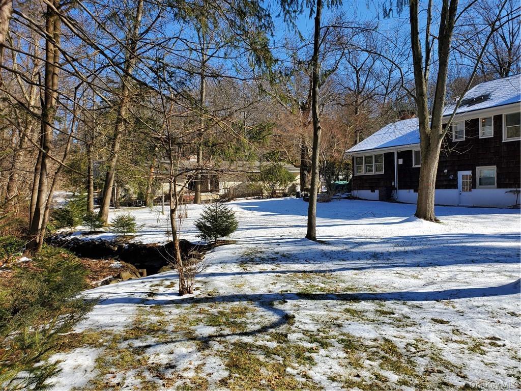 215 Harriman Road Irvington, NY 10533 - Photo 20 of 20 View of yard layered in snow