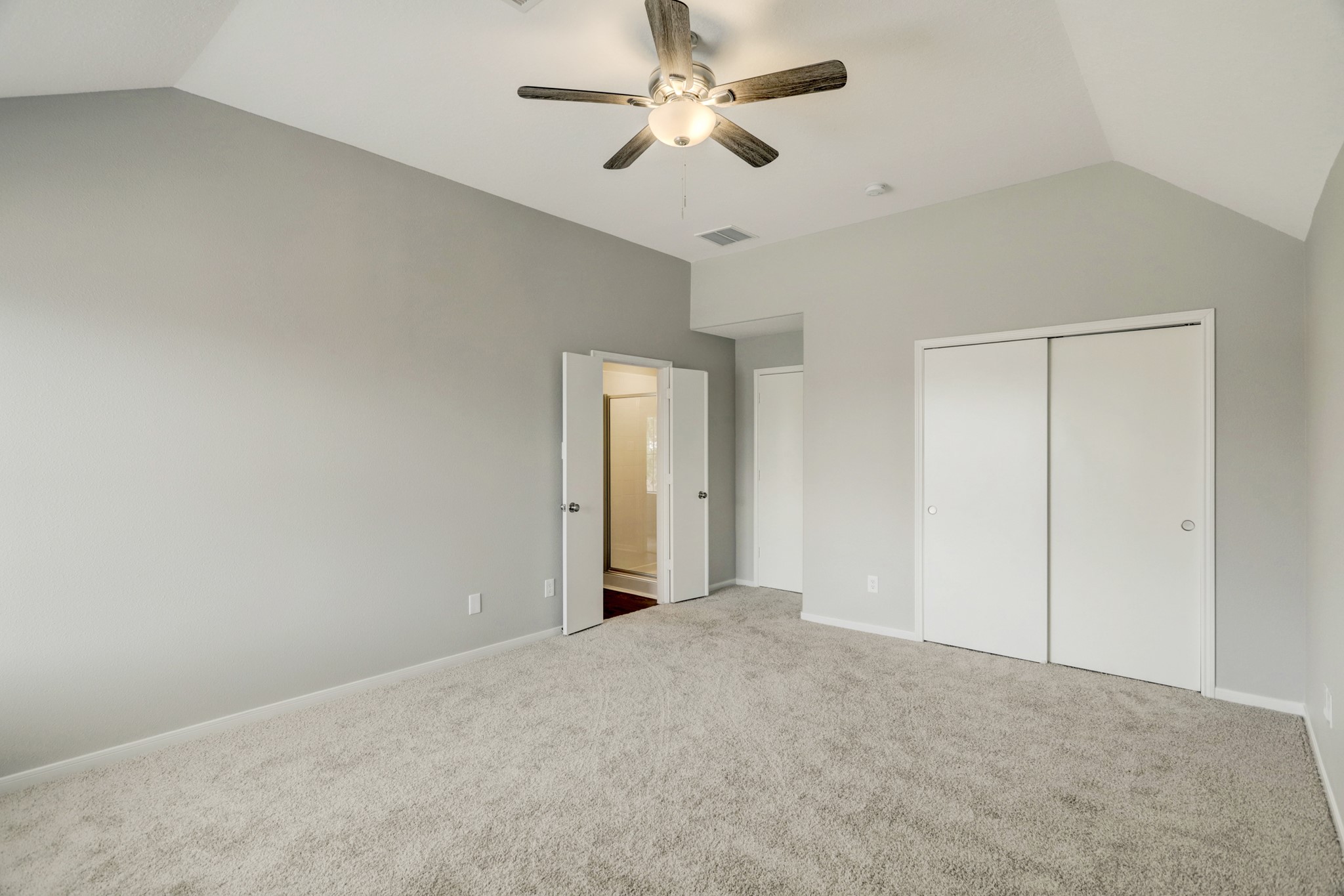 5014 Mabry Stream Court Katy, TX 77449 - Photo 5 of 13 a view of a big room with chandelier fan and closet