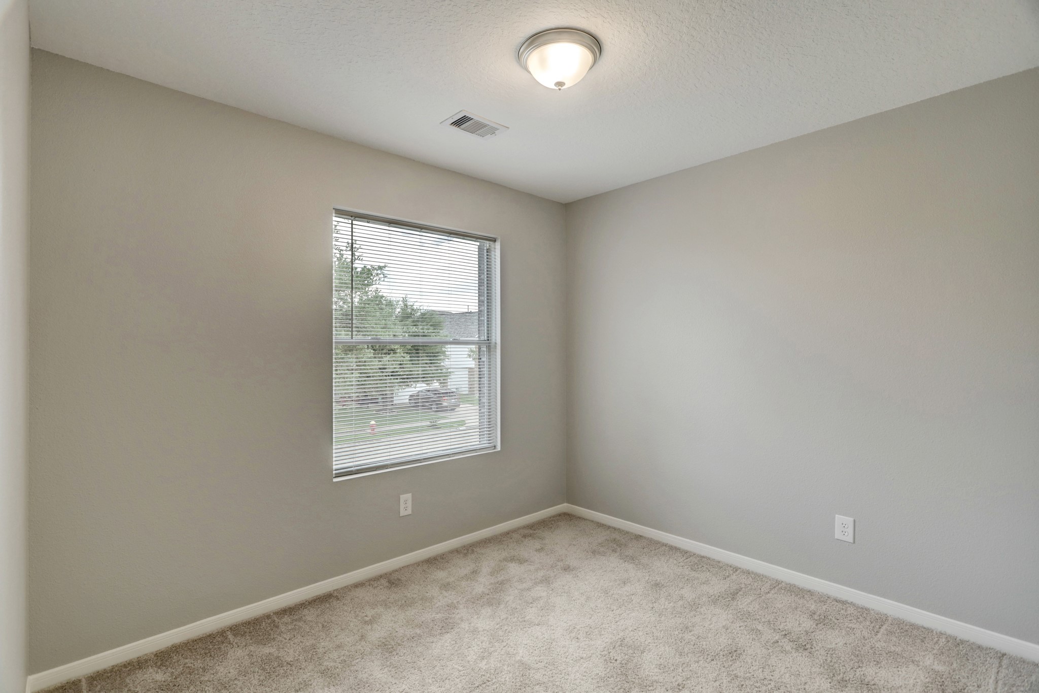 5014 Mabry Stream Court Katy, TX 77449 - Photo 9 of 13 an empty room with a window