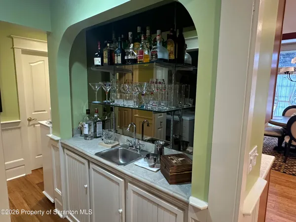 a bathroom with a sink vanity and mirror