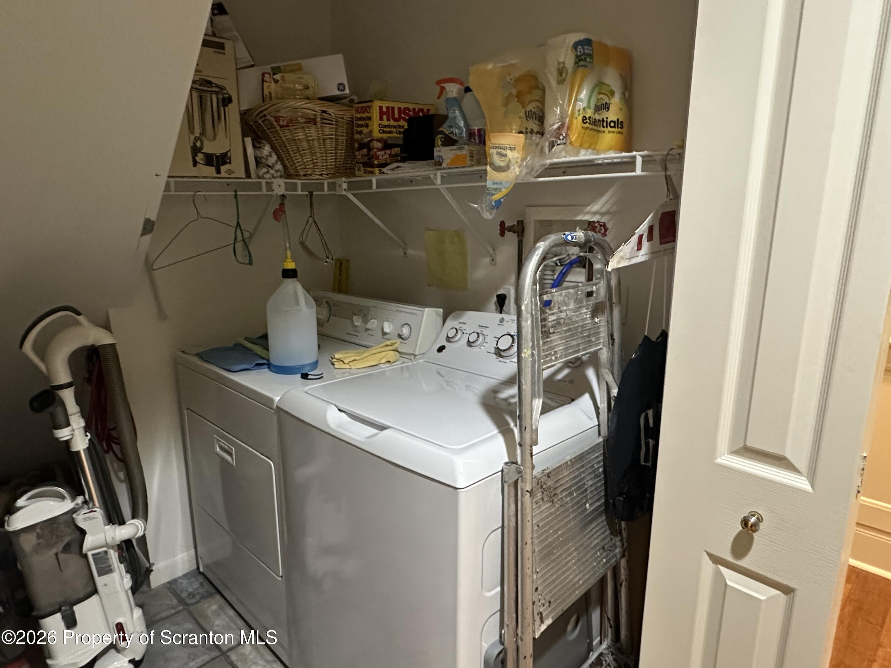 15 Fall Place Union Dale, PA 18470 - Photo 19 of 35 a utility room with dryer washer and other items