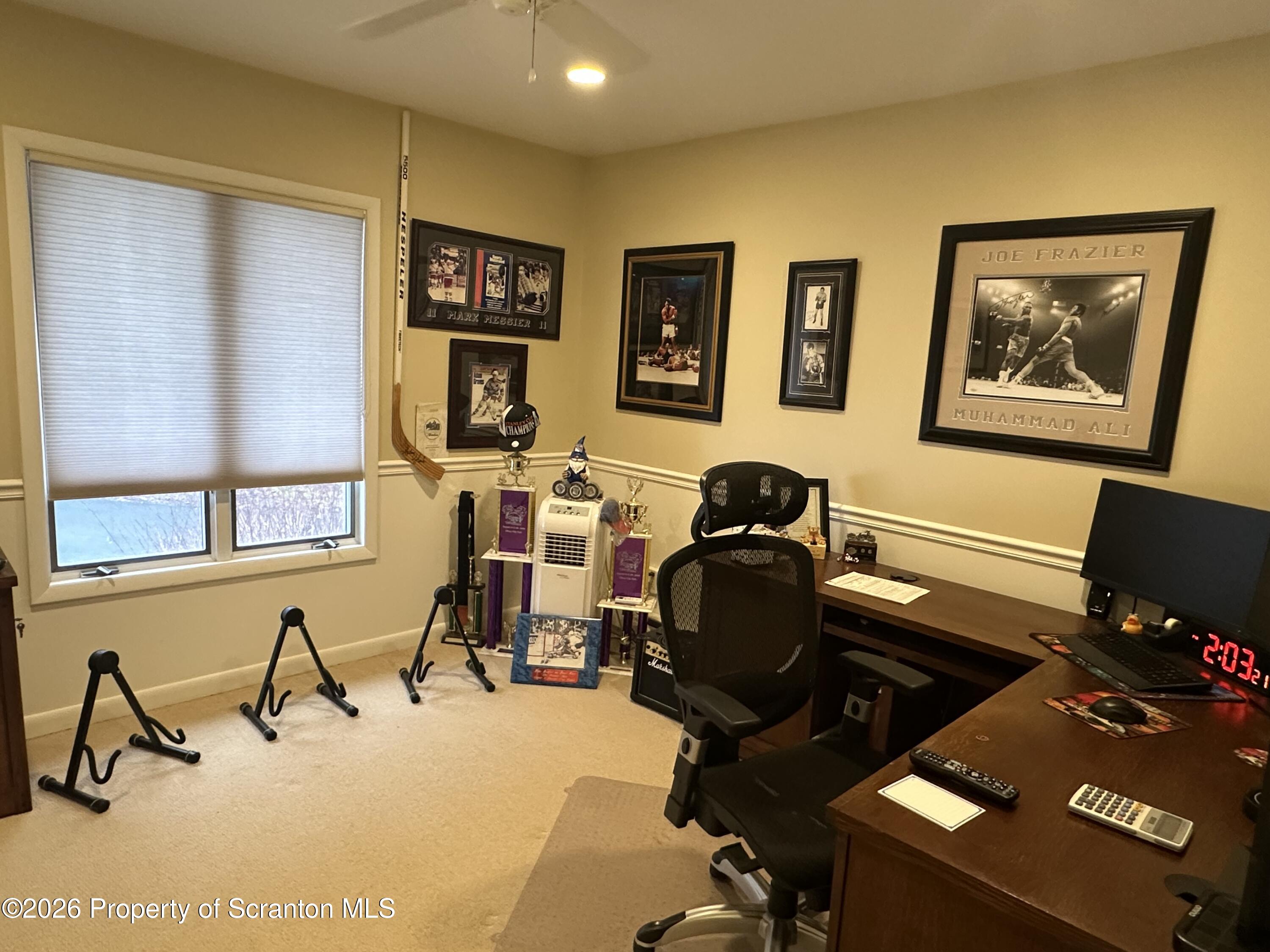 15 Fall Place Union Dale, PA 18470 - Photo 20 of 35 a view of a workspace with furniture and a window