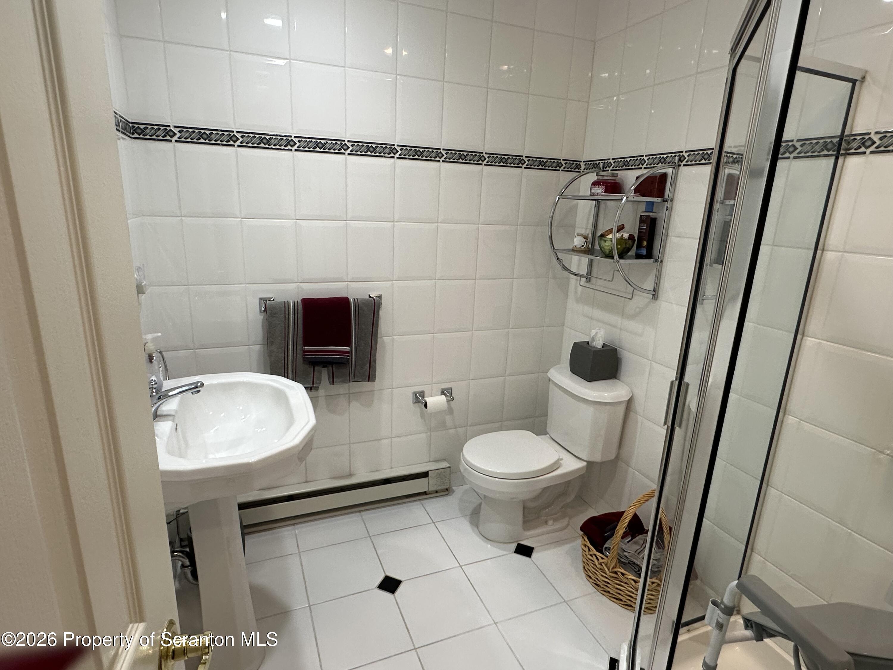 15 Fall Place Union Dale, PA 18470 - Photo 21 of 35 a bathroom with a toilet and a shower