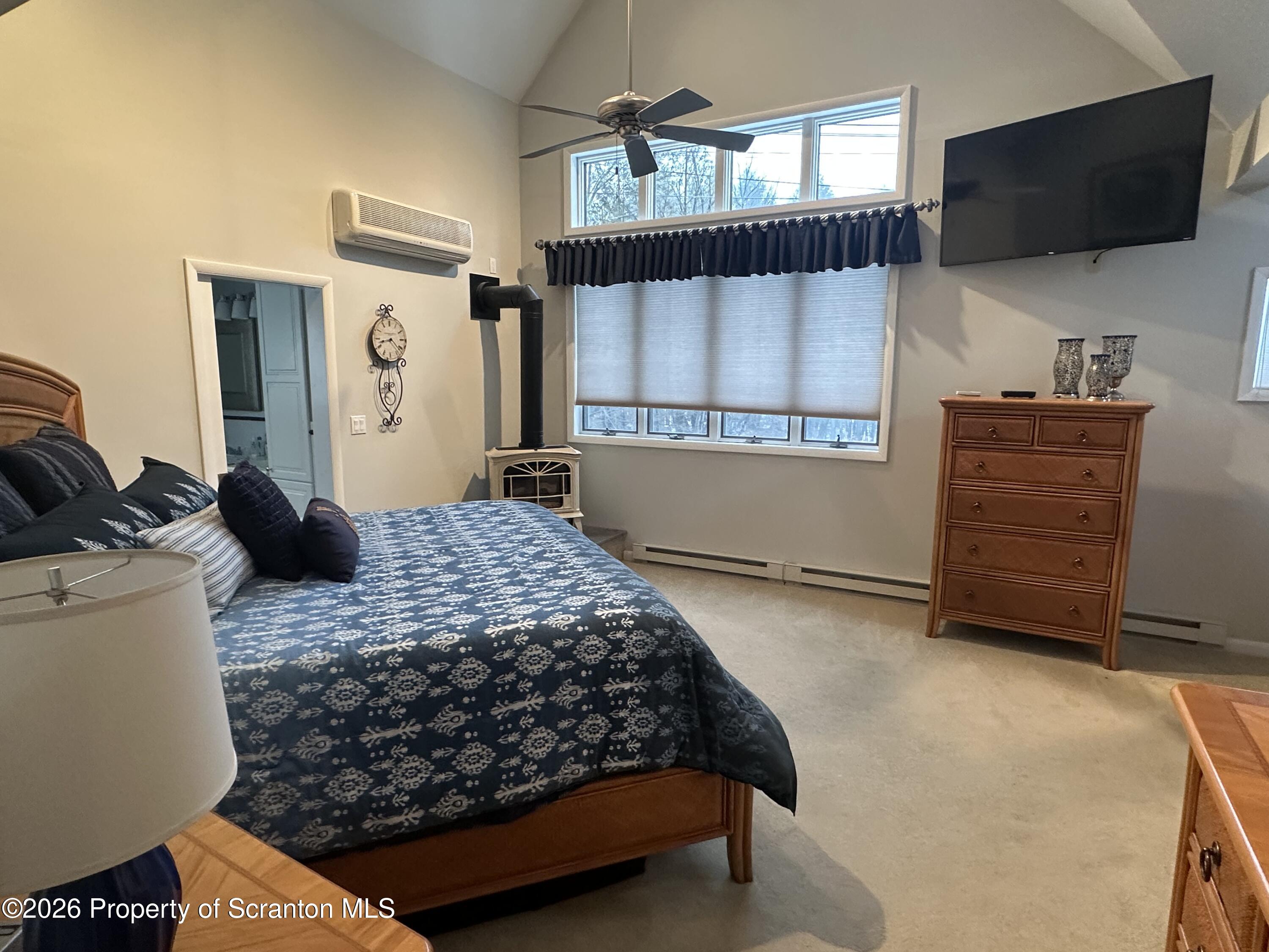 15 Fall Place Union Dale, PA 18470 - Photo 22 of 35 a bedroom with a bed and a flat screen tv
