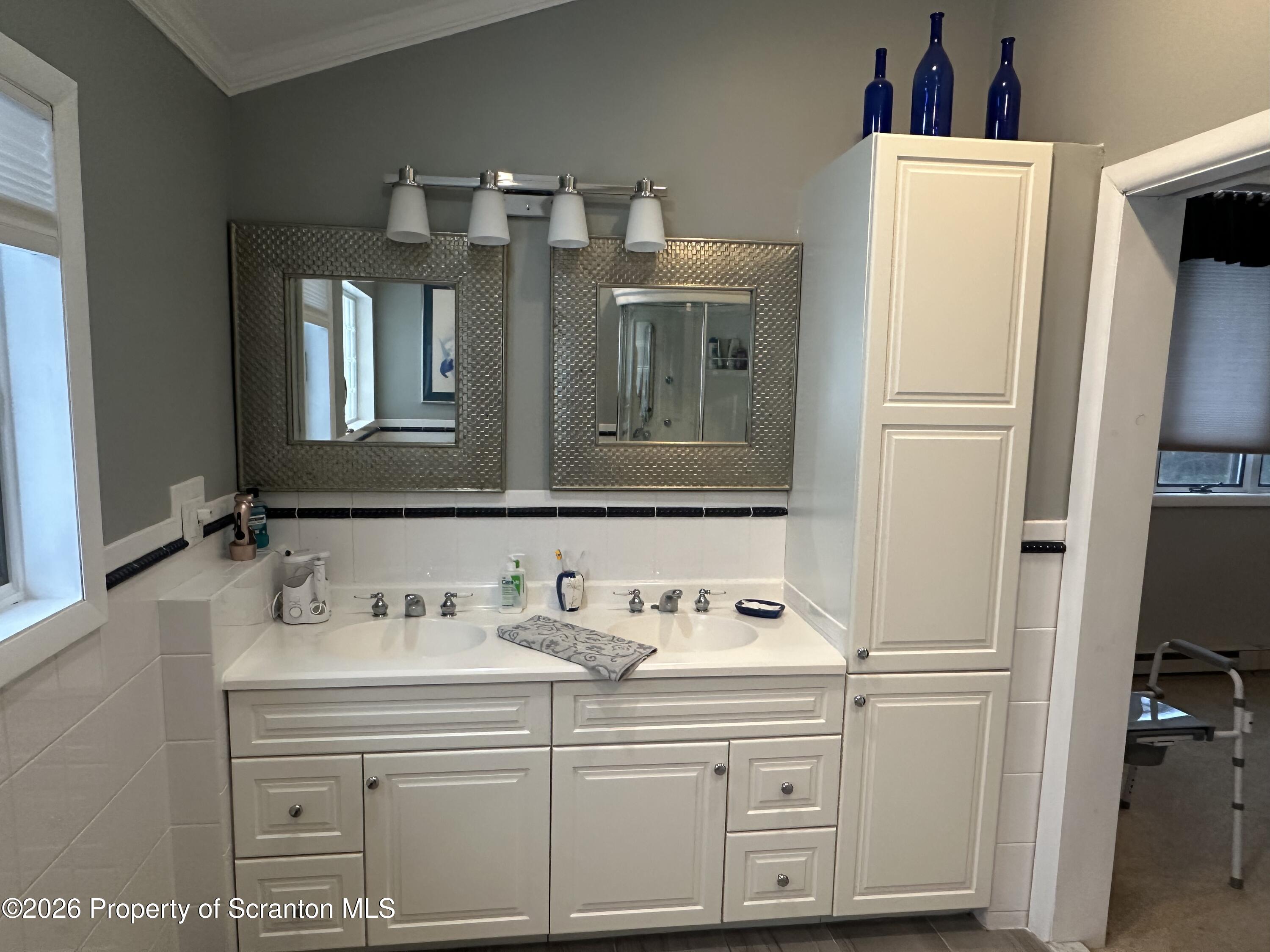 15 Fall Place Union Dale, PA 18470 - Photo 26 of 35 a bathroom with a sink vanity and mirror