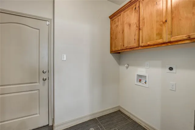 a view of cabinets and wooden floor