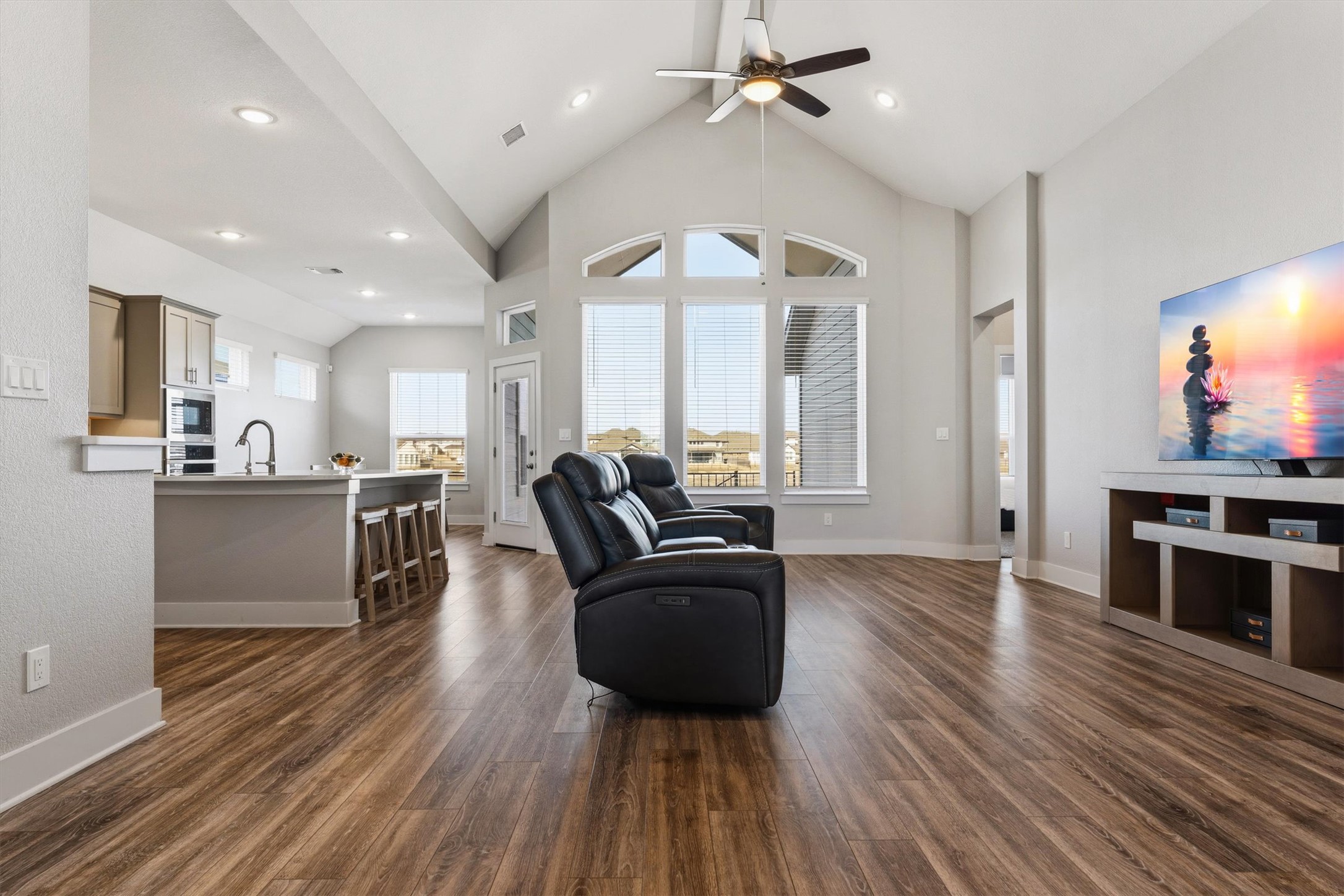 20900 Claire Jean Path Pflugerville, TX 78660 - Photo 4 of 35 a living room with furniture and a wooden floor