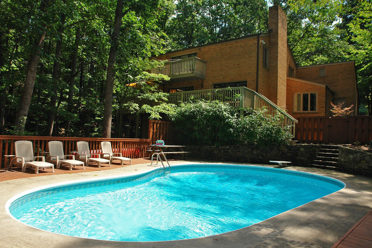 5261 Falcon Ridge Road Roanoke, VA 24018 - Photo 1 of 1 a view of a swimming pool with a patio