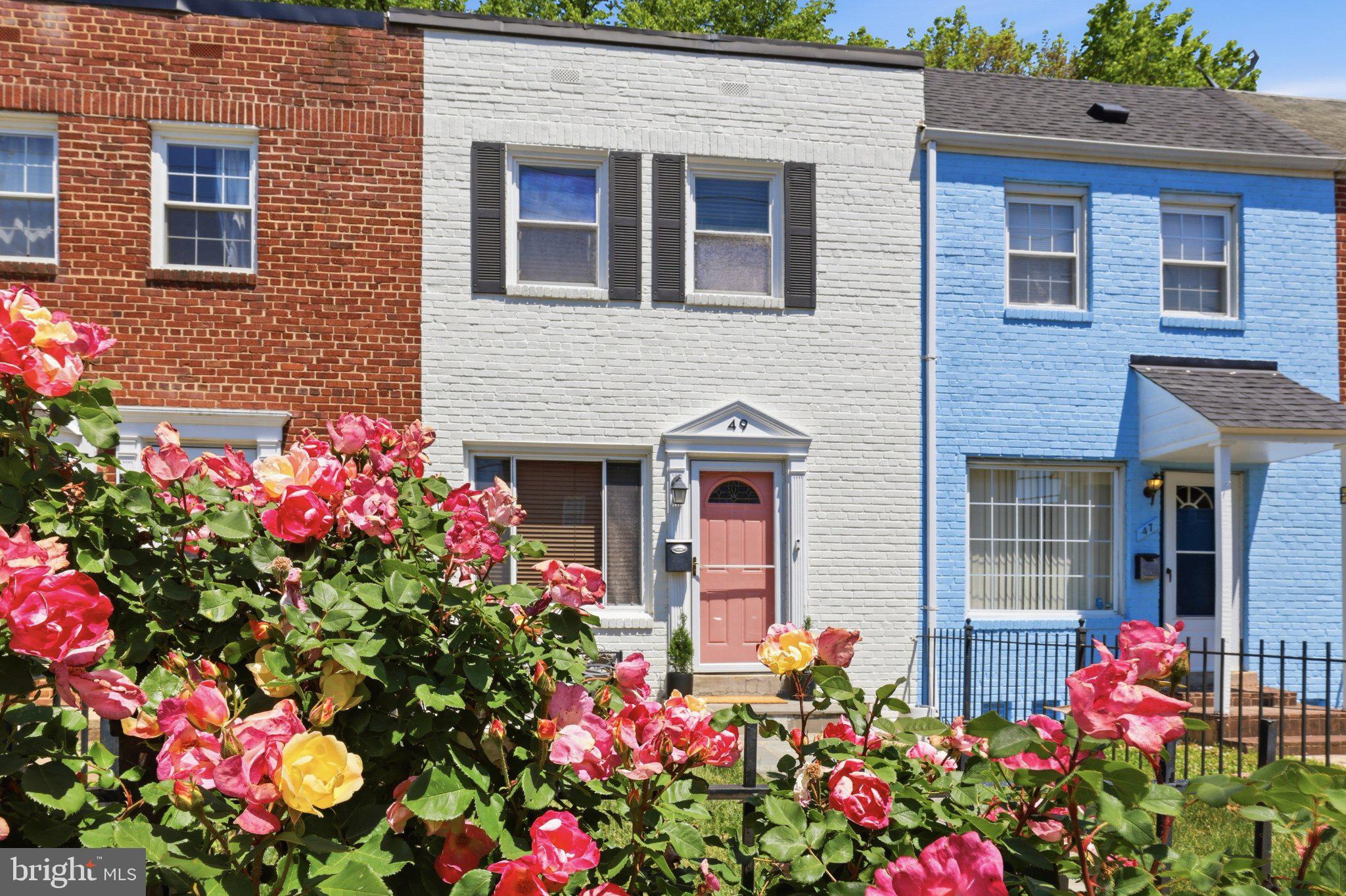 49 West Reed Avenue Alexandria, VA 22305 - Photo 9 of 29 Charming homes with vibrant blooms.