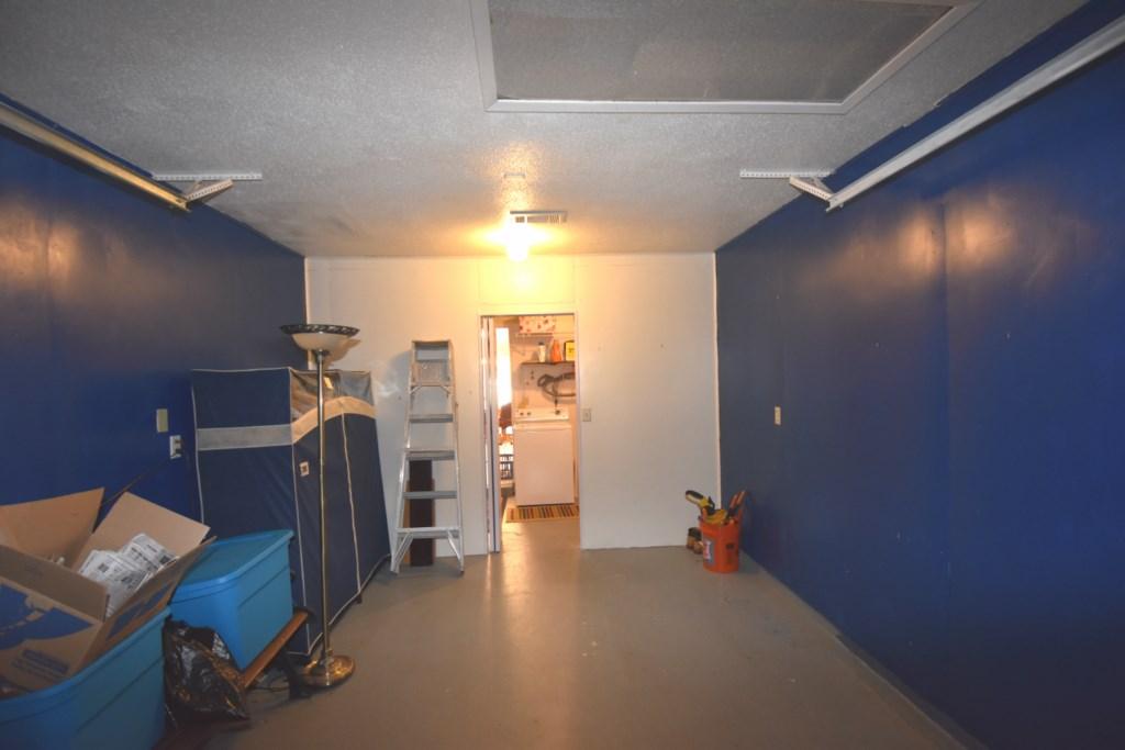 2840 Old Mill Way Crestview, FL 32539 - Photo 21 of 35 a view of hallway with furniture and a projector