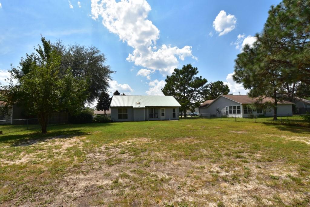 2840 Old Mill Way Crestview, FL 32539 - Photo 33 of 35 a view of a house with a yard