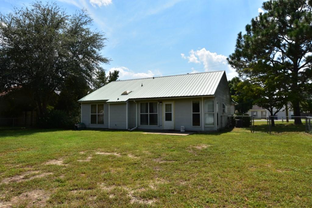 2840 Old Mill Way Crestview, FL 32539 - Photo 34 of 35 a view of a house with a yard and tree