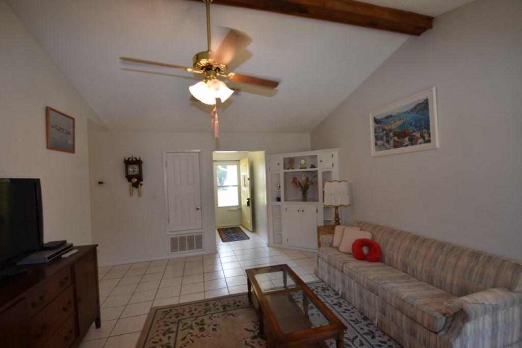 2840 Old Mill Way Crestview, FL 32539 - Photo 6 of 35 a living room with furniture and a flat screen tv