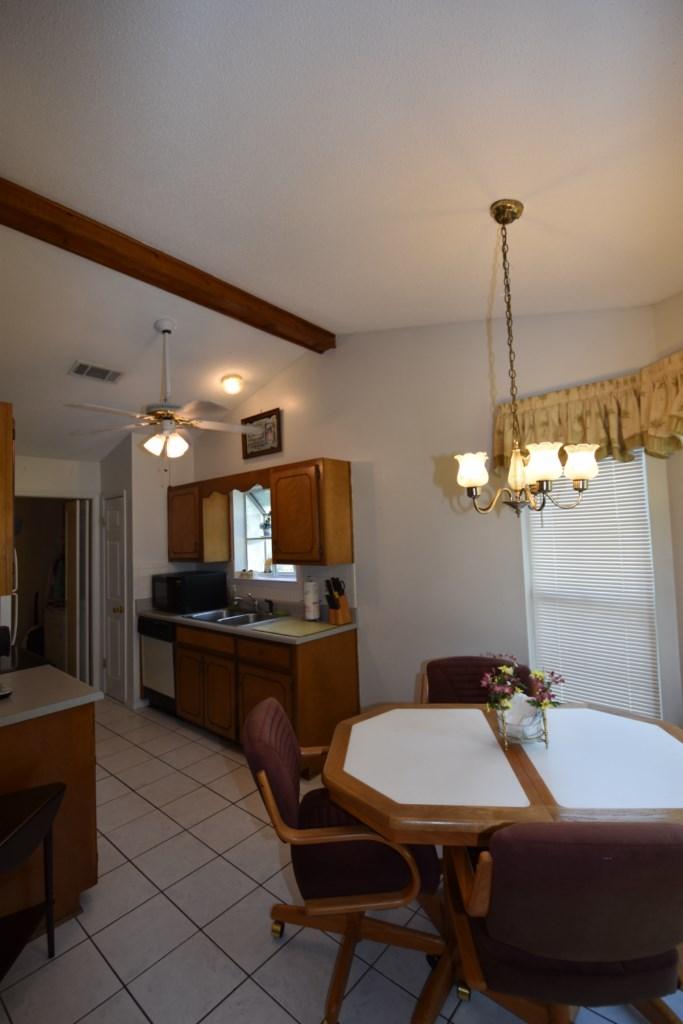 2840 Old Mill Way Crestview, FL 32539 - Photo 10 of 35 a view of a dining room with furniture