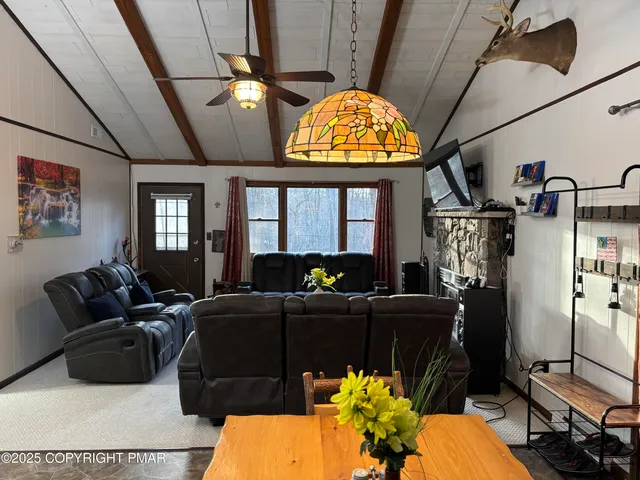 a kitchen with stainless steel appliances a refrigerator a stove a sink and a refrigerator